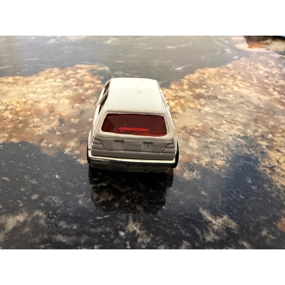 Hot Wheels 1989 Volkswagen Golf GTI White Red Stripe Diecast Toy Car 164 Scale - Picture 4 of 5